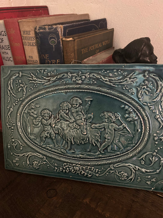 Late Victorian Green Glazed Relief Faience Plaque with Cherubs