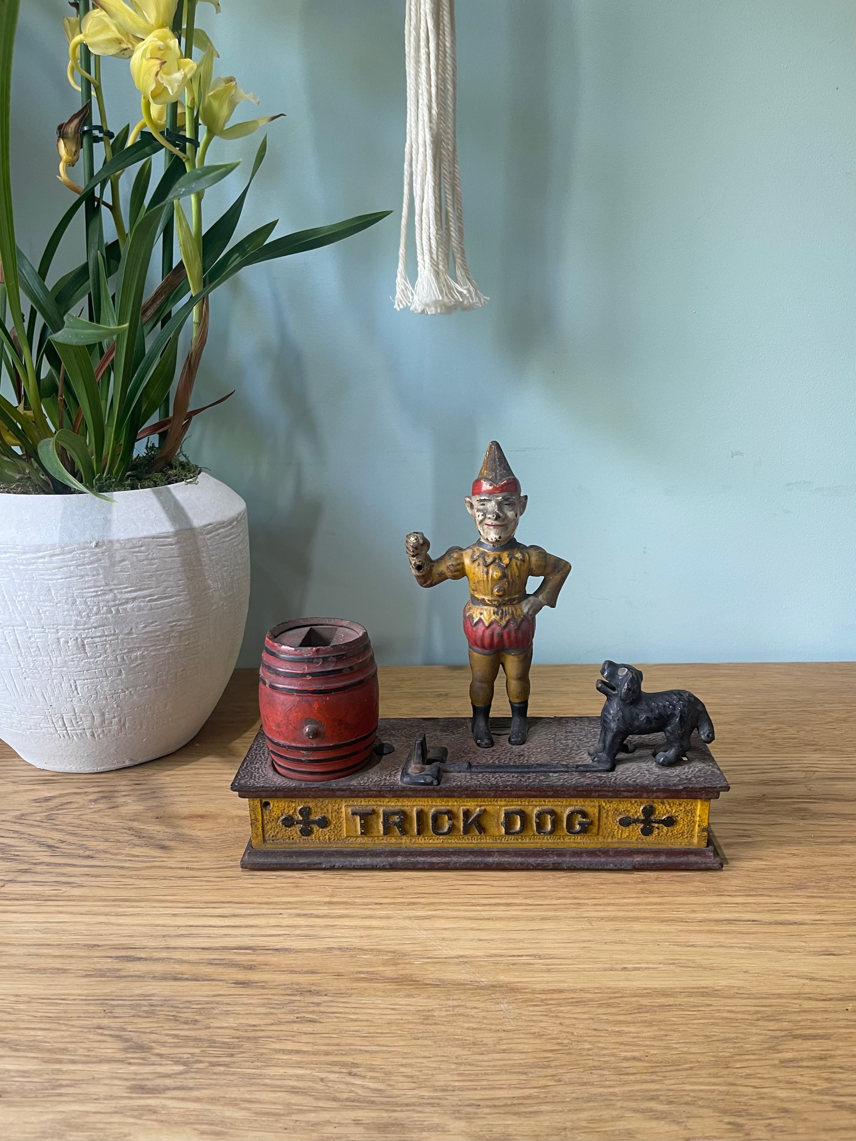 An early example of the classic trick dog money box